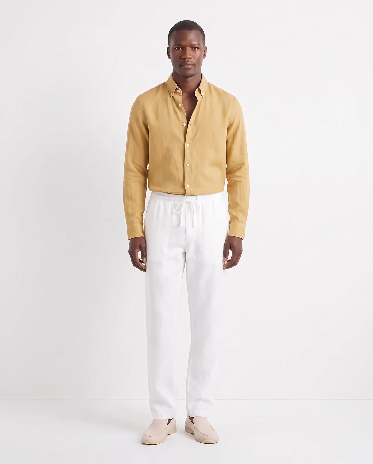 Linen Shirt — Mustard worn untucked with the top two buttons open, with Linen Trouser, Drawstring — White and Terra Loafer — Cream, Beige Sole