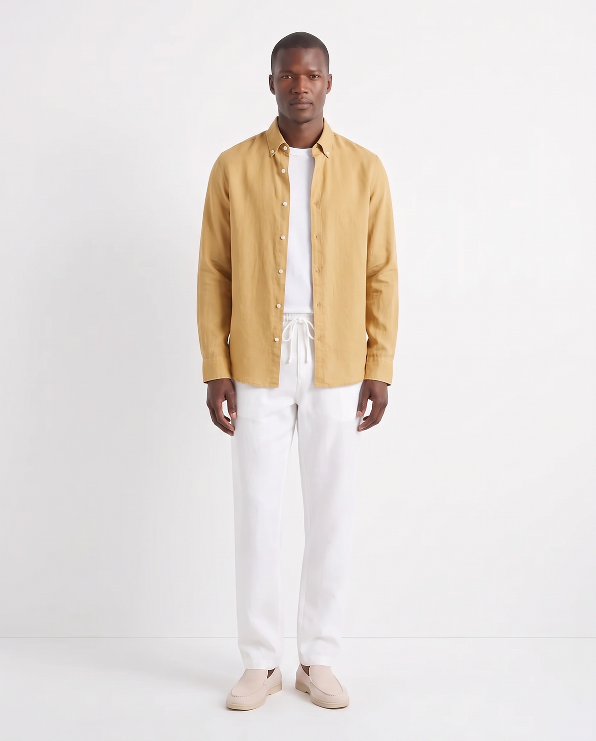 Linen Shirt — Mustard worn open over a white tee, with Linen Trouser, Drawstring — White and Terra Loafer — Cream, Beige Sole