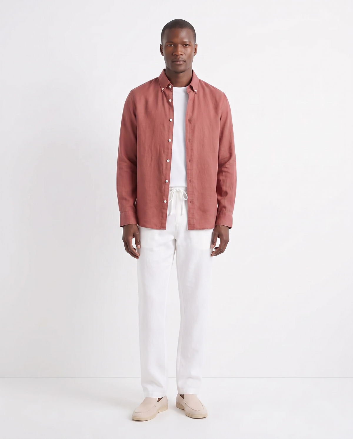 Linen Shirt — Brick Red worn open over a white tee, with Linen Trouser, Drawstring — White and Terra Loafer — Cream, Beige Sole