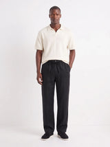 Heritage Linen Trouser — Black — worn by the model, front (relaxed fit)