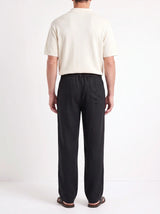 Heritage Linen Trouser — Black — worn by the model, back (relaxed fit)