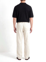 Heritage Linen Trouser — Cream — worn by the model, back (relaxed fit)