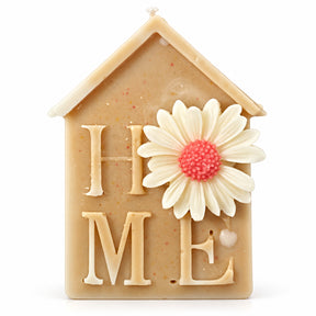 Home Candle – house-shaped candle with raised HOME letters and a daisy