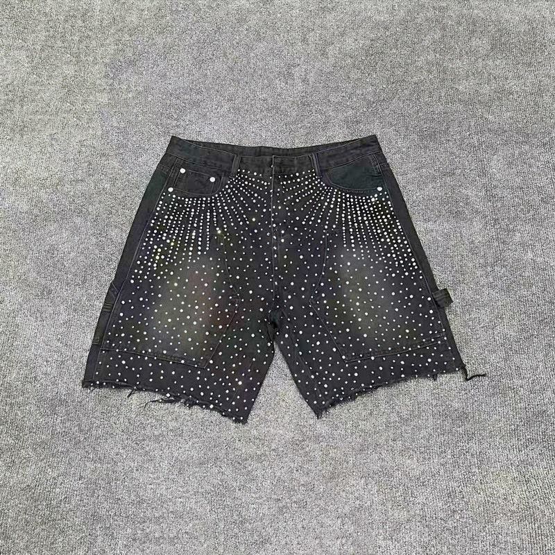 Black rhinestone-studded denim shorts.