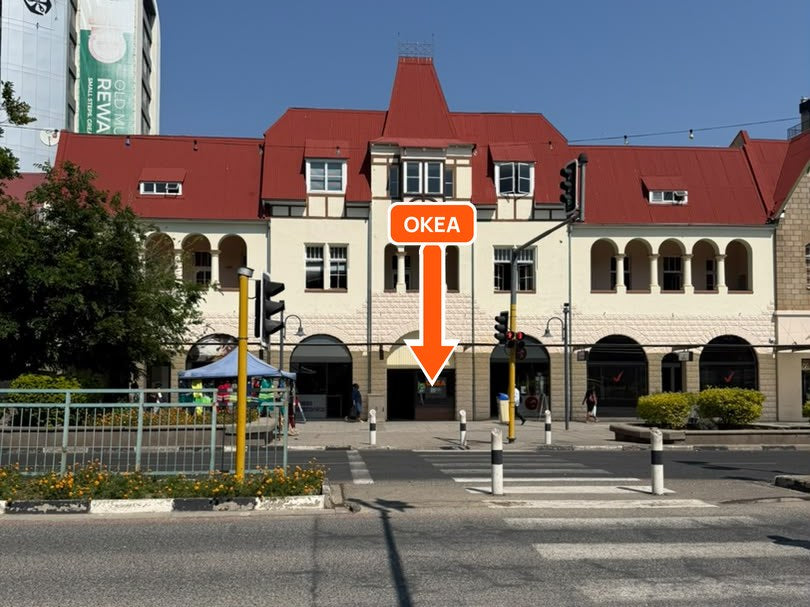 Our building with the pointed red tower, seen from the crossing